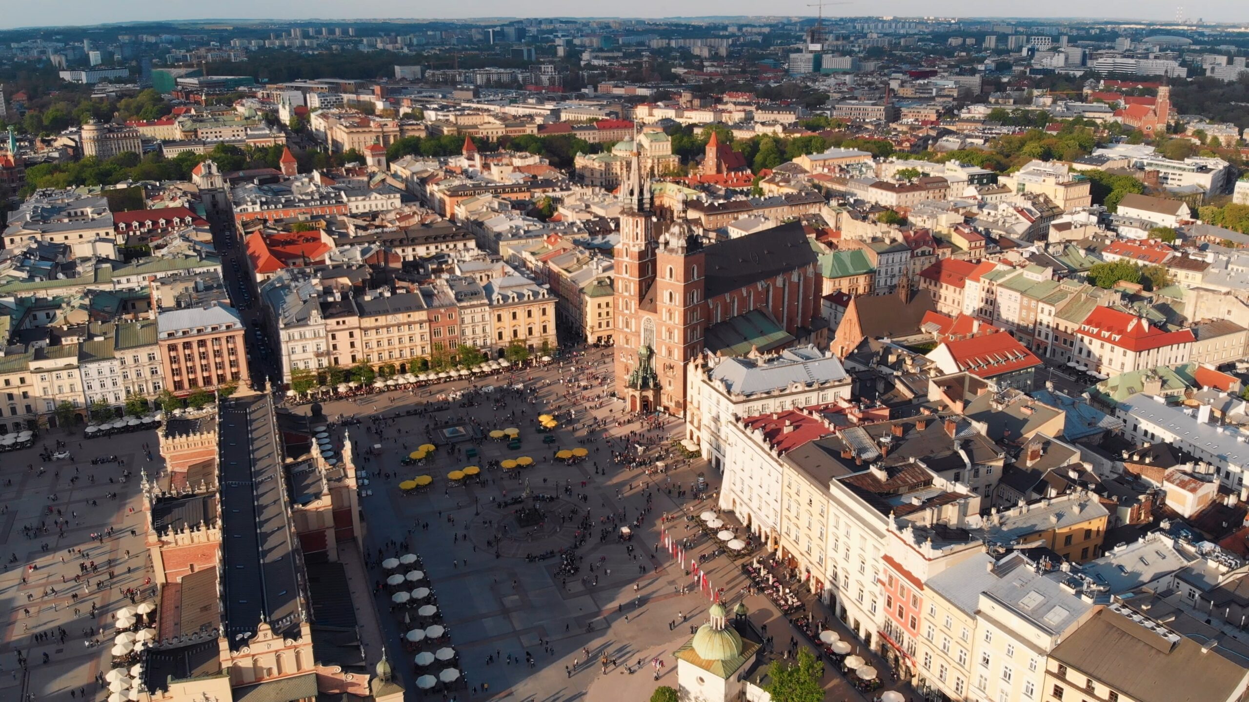 Krakow, Poland. Main Square With Saint Mary Church. Big City Square. Aerial Drone View